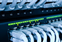 Network switch and cables blue toned
